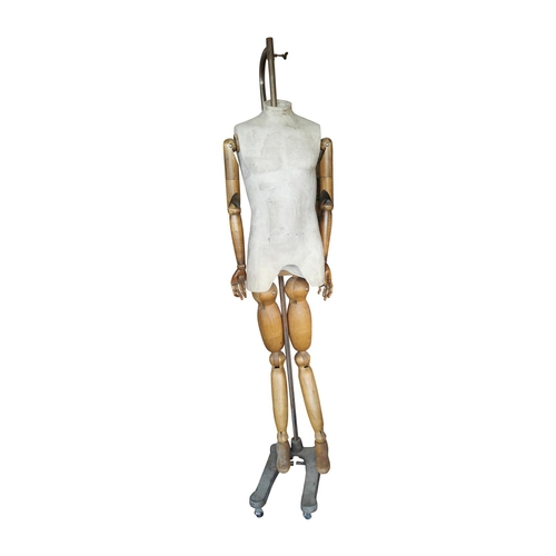 939 - Mannequin on cast iron base. {200 cm H x 50 cm W x 44 cm D}