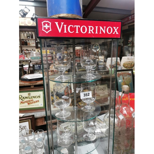 352 - Victorinox glass display advertising cabinet with key {76 cm H x 31 cm W x 31 cm D}.