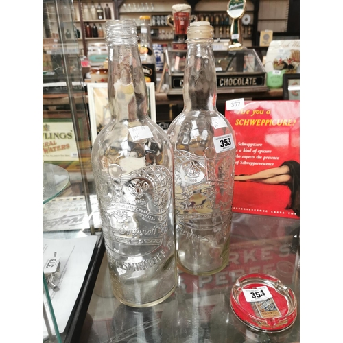 353 - Two glass Smirnoff Vodka advertising display bottles {44 cm H}.