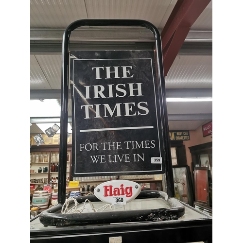 359 - The Irish Times double sided tin plate shop sign on metal stand {85 cm H x 67 cm W}.