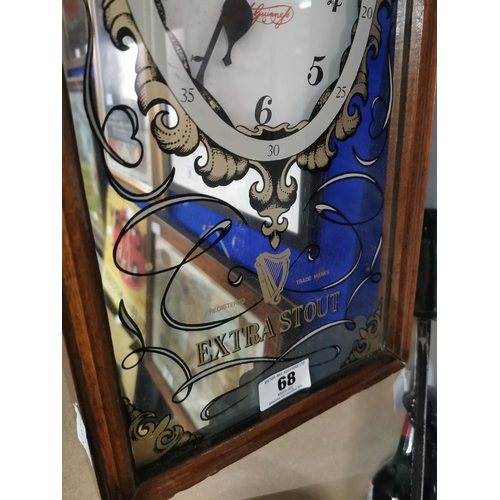 68 - Guinness Extra Stout mirrored advertising clock with wooden case. {53 cm h x 27 cm W x 9 cm D}