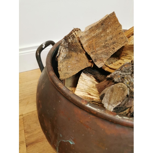 107 - 19th C. hand rivetted metal log bucket. { 28 cm H x 51 cm Diam}.