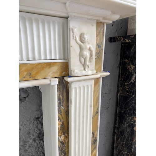 100 - Irish Georgian statutory and convent Sienna marble chimney piece. The apron decorated with a plaque ... 