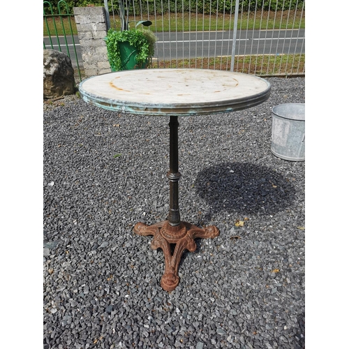 13 - Circular garden table raised on cast iron base {74 cm H x 60 cm Dia.}.