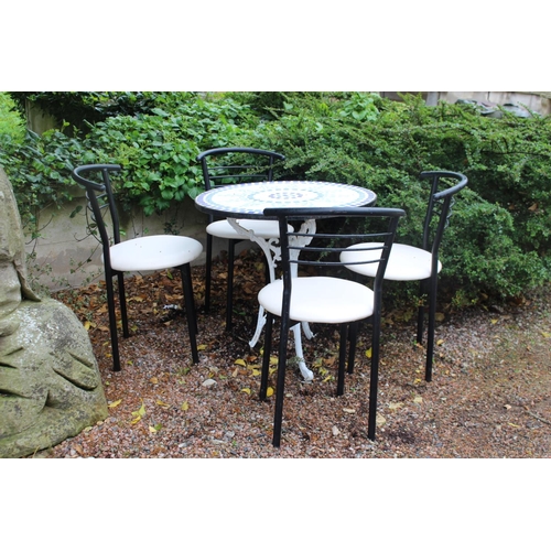 17 - Garden table with mosaic top raised on cast iron base with four metal and leather upholstered chairs... 