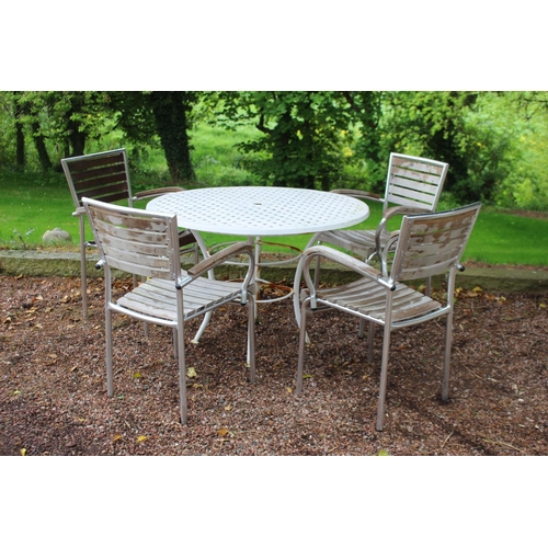 27 - Garden table with aluminium top raised on wrought iron base with four chrome chairs.  Table {72 cm H... 
