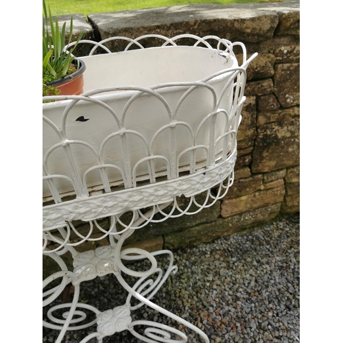 38 - Metal plant stand with liner {95 cm H x 67 cm W x 30 cm D}.