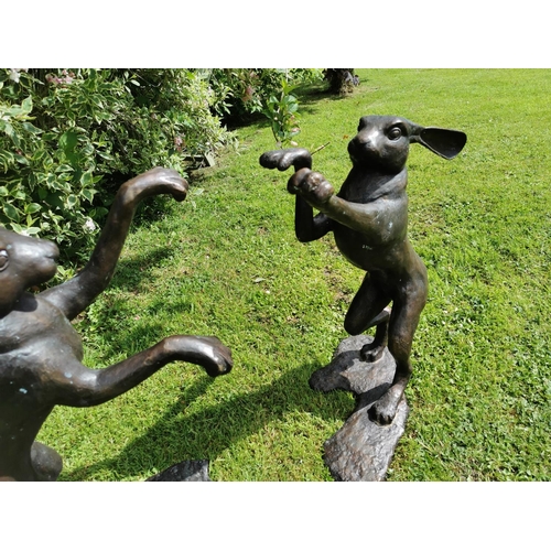 39 - Exceptional quality bronze models of fighting hares {87 cm H x 60 cm W x 30 cm D and 75 cm H x 65 cm... 