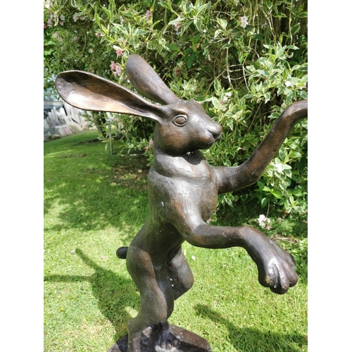 39 - Exceptional quality bronze models of fighting hares {87 cm H x 60 cm W x 30 cm D and 75 cm H x 65 cm... 
