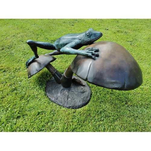 46 - Exceptional quality bronze model of a Frog in motion leaping on a toad stool {54 cm H x 86 cm W x 44... 
