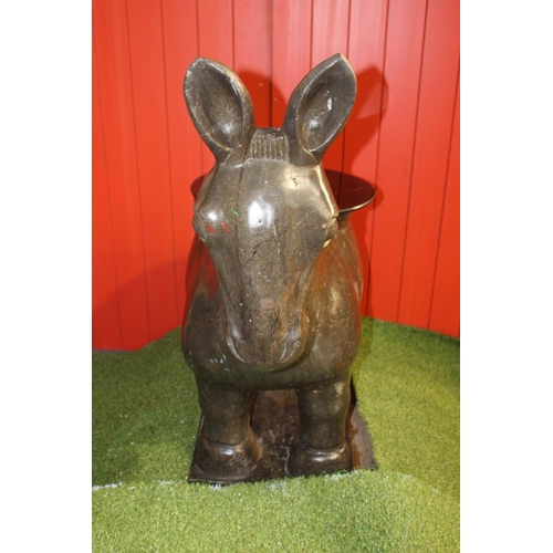 104 - Stone model of a Donkey surmounted with glass planter base. { 110 cm H x 106 cm W x 49 cm D}.