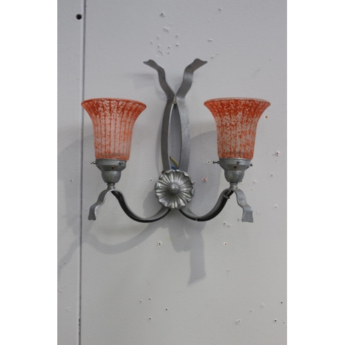 125 - Twin metal wall light with central flower decoration and orange shades {36 cm H x 39 cm W x 19 cm D}... 