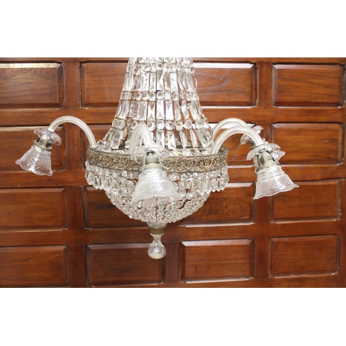 148 - Brass and glass crystal five branch chandelier {100 cm H x 95 cm Dia.}.