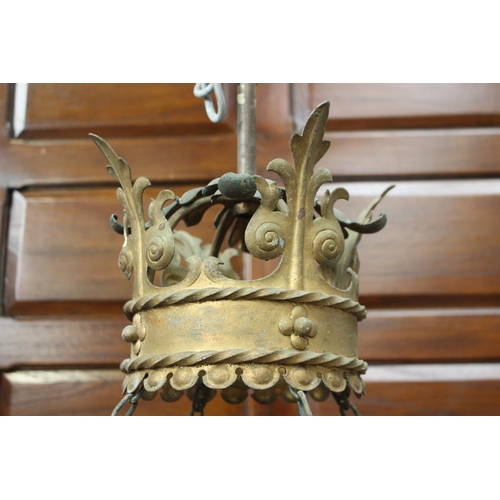 166 - Four branch brass chandelier in the Medieval style {80 cm H x 102 cm Dia.}.