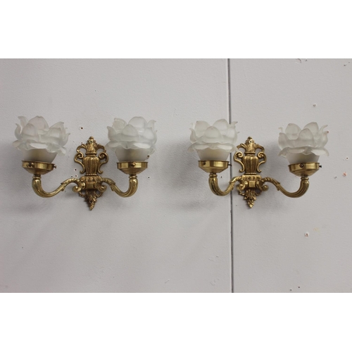 167 - Pair of brass wall lights with frosted glass shades {17 cm H x 35 cm W x 14 cm D}.