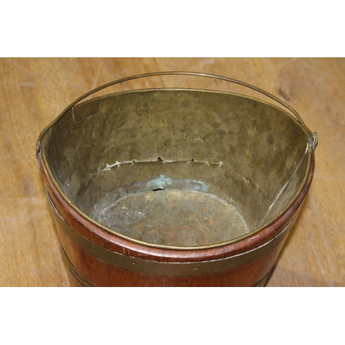 191 - Teak and brass bound oyster coal bucket {34 cm H x 33 cm W x 26 cm D}.