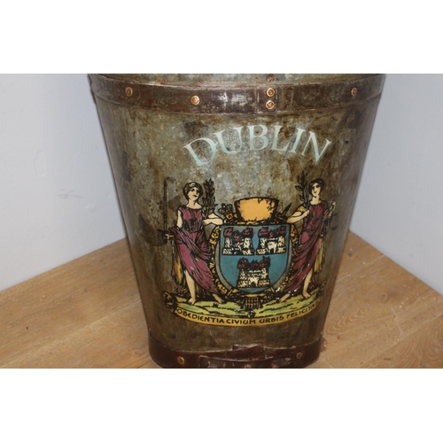 193 - Metal log basket with painted Dublin Castle amorial {76 cm H x 59 cm W x 26 cm D}.