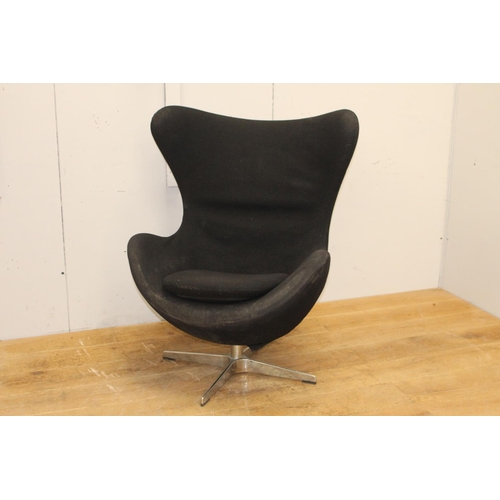 257 - Black velvet upholstered  swivel chair {105 cm H x 80 cm W x 50 cm D}.