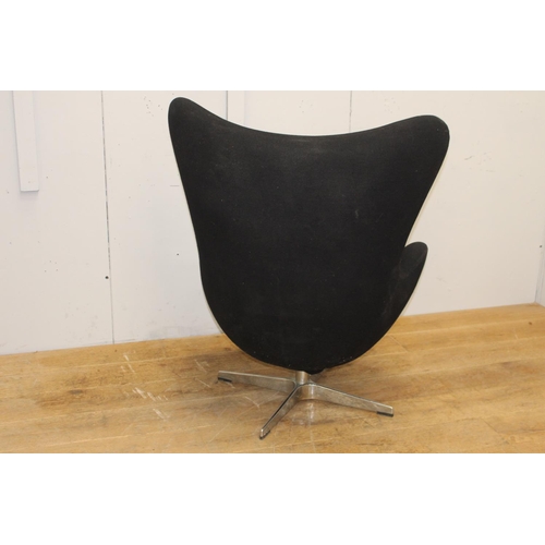 257 - Black velvet upholstered  swivel chair {105 cm H x 80 cm W x 50 cm D}.