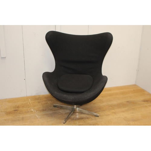 258 - Black velvet upholstered  swivel chair {105 cm H x 80 cm W x 50 cm D}.