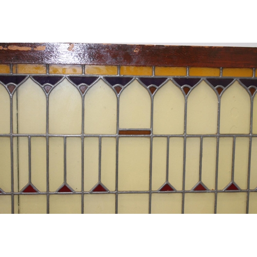 267 - Three piece leaded stain glass window {153 cm H x 118 cm W x 4 cm D}.