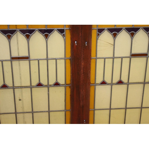 267 - Three piece leaded stain glass window {153 cm H x 118 cm W x 4 cm D}.