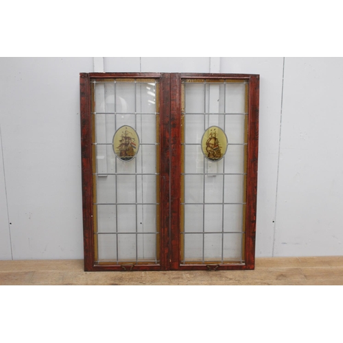 268 - Pair of leaded stain glass windows with Ship motif {140 cm H x 51 cm W x 3 cm D}.