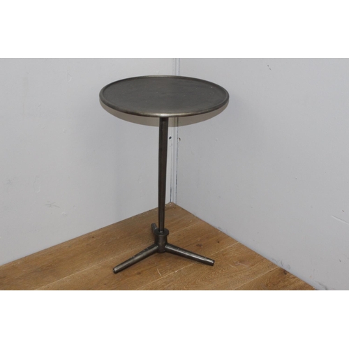 274 - Brushed bronze aluminium lamp table raised on three splayed feet {60 cm H x 39 cm Dia.}.