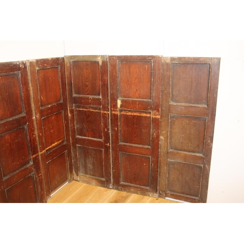 289 - Seven pitch pine panels {137 cm H x 345 cm W x 3 cm D}.