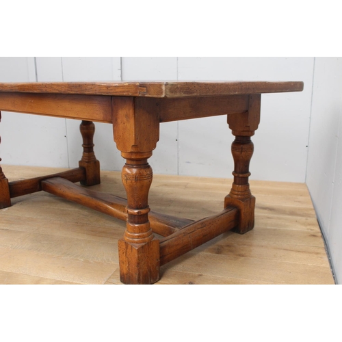 290 - Good quality oak Refectory table raised on turned legs and single stretcher {76 cm H x 183 cm W x 91... 