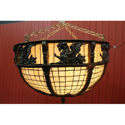 302 - Bronze and opaque glass hanging centre light decorated with Pegasus. { 65 cm H x 79 cm Diam}.