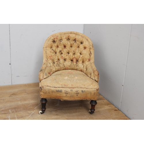 319 - Deep buttoned upholstered nursing chair rasied on turned legs and ceramic casters {76 cm H x 60 cm W... 