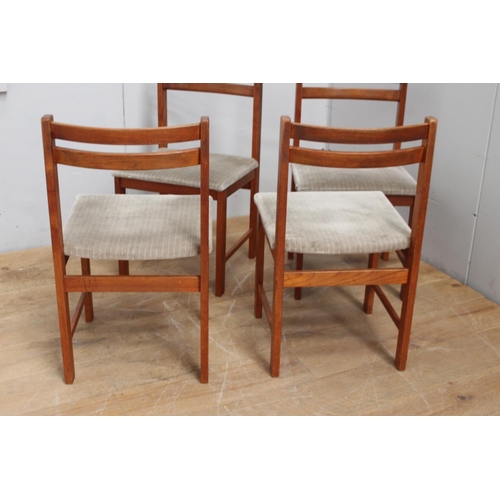 322 - Set of four mid-century teak chairs with upholstered seats {78 cm H x 44 cm W x 42 cm D}.