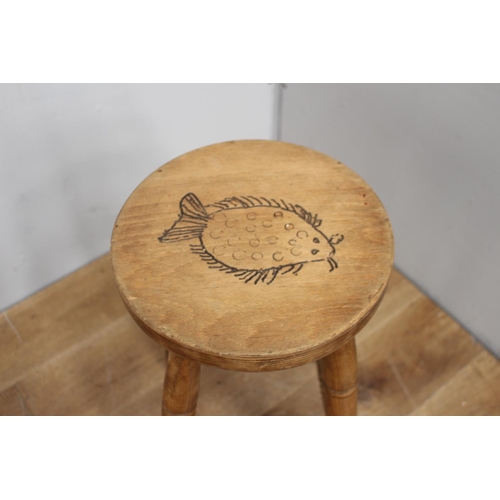 325 - Tall pine milking stool with fish design {70 cm H x 30 cm Dia.}.