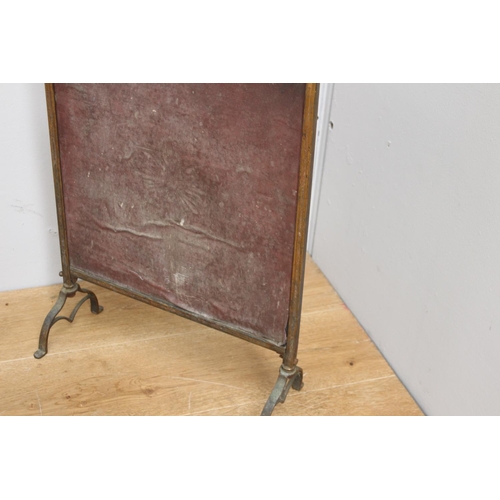 329 - Brass fire screen with bevelled mirror panel  {65 cm H x 40 cm W x 49 cm D}.