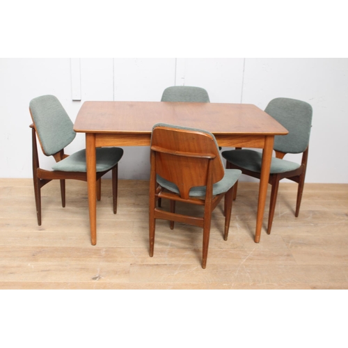 331 - Retro teak extendable tableraised on tapered legs with four matching teak and upholstered chairs {Ta... 