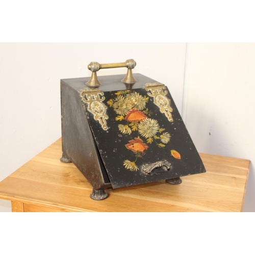 353 - Metal and brass coal scuttle decorated with flowers {37 cm H x 29 cm W x 40 cm D}.