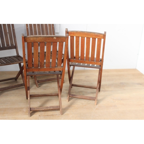 359 - Set of four oak folding garden chairs {90 cm H x 43 cm W x 50 cm D}.