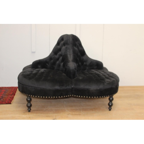 373 - Black velvet deep buttoned upholstered four seat conversation seat {100 cm H x 170 cm Dia.}.