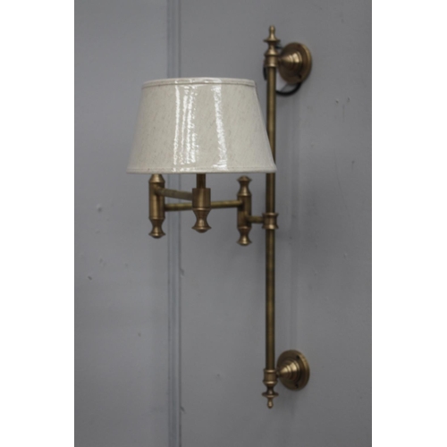 376 - Brass adjustable wall lamp {64 cm H x 22 cm W x 56 cm D}.