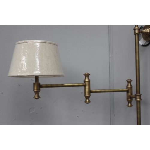 376 - Brass adjustable wall lamp {64 cm H x 22 cm W x 56 cm D}.