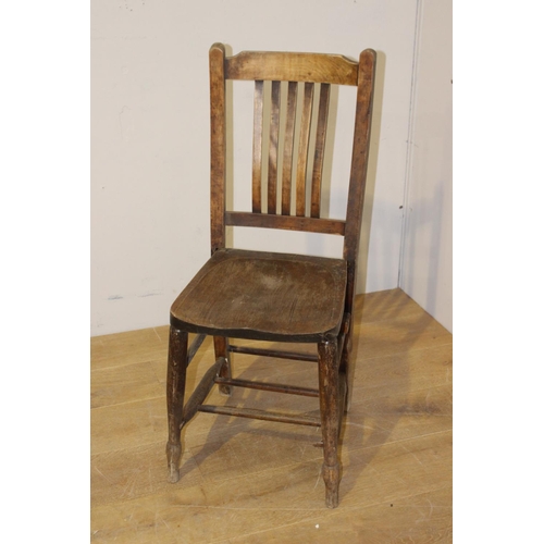 61 - Oak ecclesiastical side chair {90 cm H x 35 cm W x 38 cm D}.