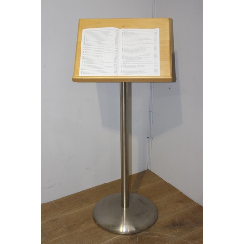 64 - White metal menu stand {122 cm H x 50 cm W x 30 cm D}.