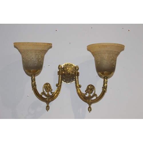 71 - Double brass wall light with amber shades {30 cm H x 47 cm W x 20 cm D}.