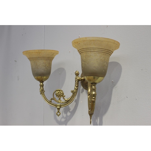 76 - Double brass wall light with amber shades {30 cm H x 47 cm W x 20 cm D}.