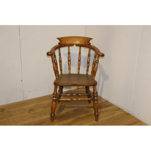 206 - Oak Captain's chair {88 cm H x 65 cm W x 49 cm D}.