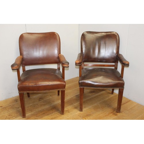 208 - Pair of wooden and leather upholstered studded armchairs {87 cm H x 59 cm W x 47 cm D}.