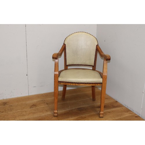 210 - Wooden and cream leather upholstered studded armchair {87 cm H x 59 cm W x 47 cm D}.