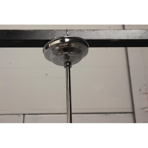 218 - Set of four chrome hanging lights with opaque glass shades {135 cm H x 30 cm Dia.}.