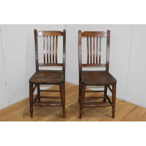 229 - Pair of oak ecclesiastical chairs {89 cm H x 38 cm W x 35 cm D}.